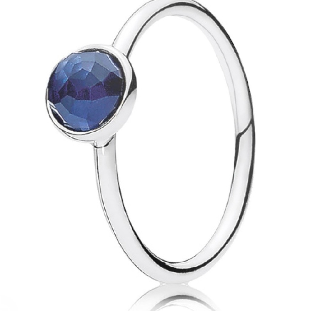 Elegant Silver Ring with Blue Gemstone